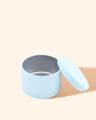 Baby Blue tin with matching lid, shown empty