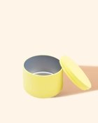 Lemon tin with matching lid, shown empty